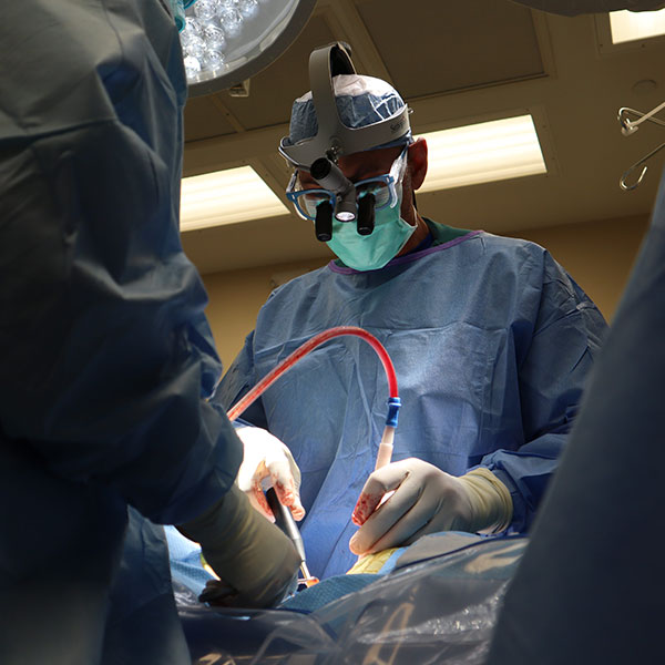 Stefano M. Sinicropi, M.D., F.A.A.O.S. Orthopedic Spine Surgeon performing surgery